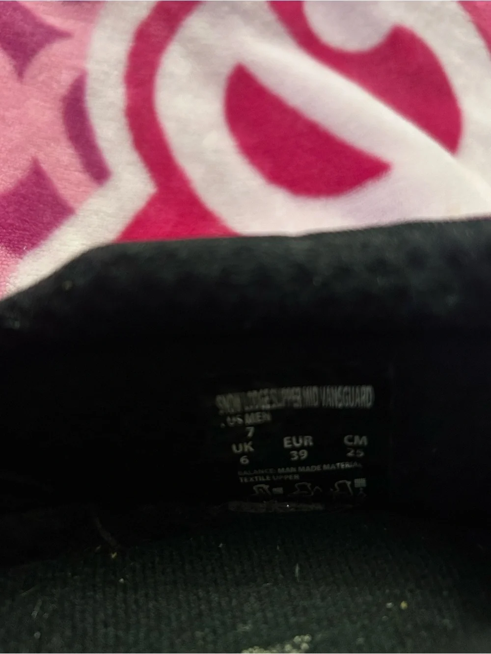 Vans Black Slip-On Sneakers with White Midsole and Gum Outsole